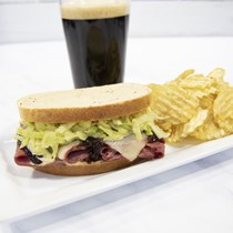 BBQ style Corned beef, Guinness BBQ Sauce, Honey Mustard Slaw and Pepper Jack Cheese